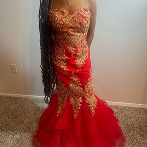 A red prom dress and it is mermaid fit